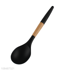 Wholesale non-stick nylon core silicone cooking spoon with wooden handle
