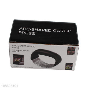 Wholesale arc-shaped garlic press manual stainless steel garlic press