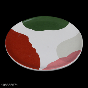 Wholesale round glazed ceramic <em>plate</em> porcelain dish artistic dinnerware