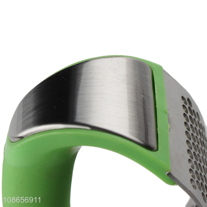 Factory price handheld stainless steel garlic press for sale