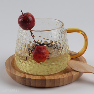 Wholesale heat resistant glass tea cup embossed glass mugs with handle