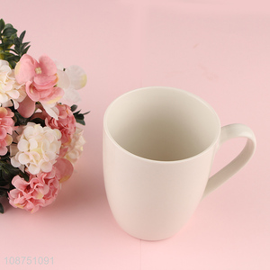 Top selling white ceramic water cup water mug with handle