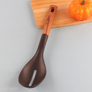 Yiwu market kitchen utensils slotted spoon for sale