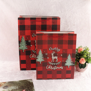 Custom logo Christmas <em>paper</em> gift bag with <em>handles</em>