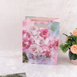Good quality floral print paper <em>gift</em> <em>bag</em> with handles